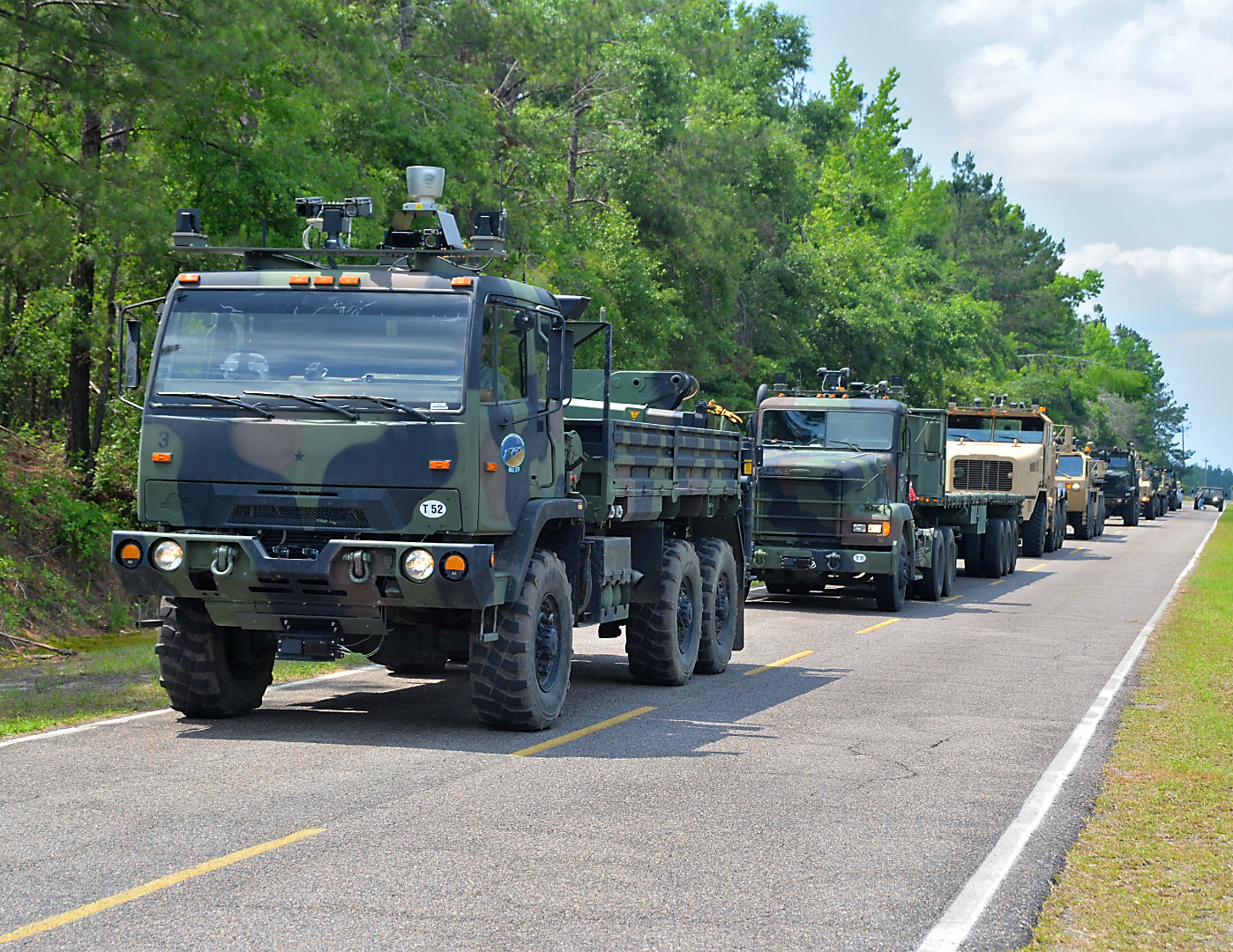 Lockheed Martin is testing driverless convoy technology called Automous Mobility Appliqué System for military uses.  