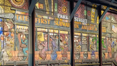 Relief panel in Boston subway station depicting "America's first subway."