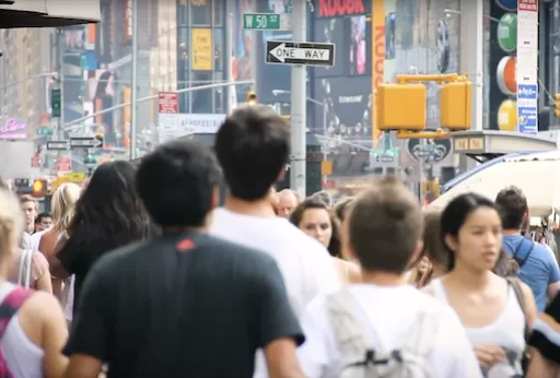 Crowd walking in urban street