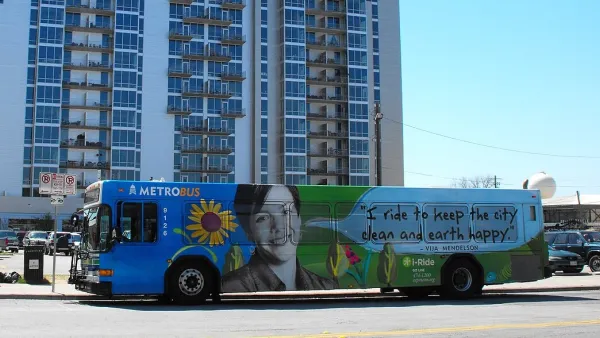Blue Austin public transit bus with graphic reading "I ride to keep the city clean and earth happy."
